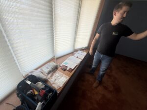IES consultant conducting a Designated Substance Survey before renovation in Ontario