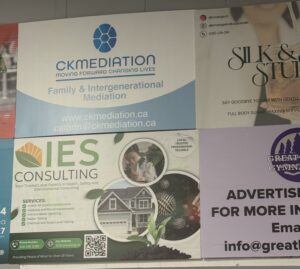 IES Consulting advertisement featuring environmental testing services, displayed below CK Mediation among other local business ads.